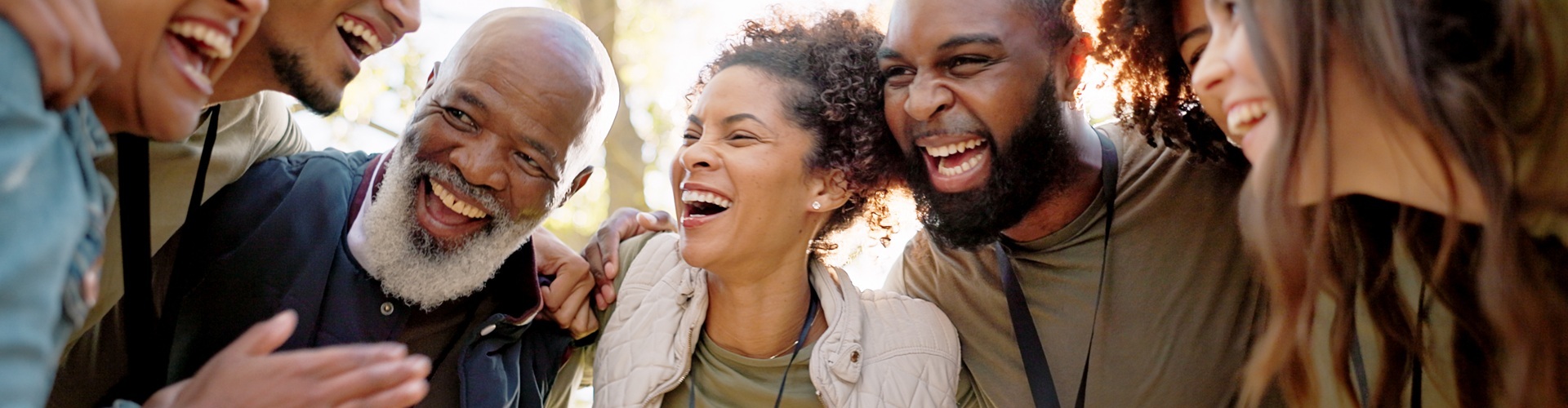 group of volunteers in a huddle